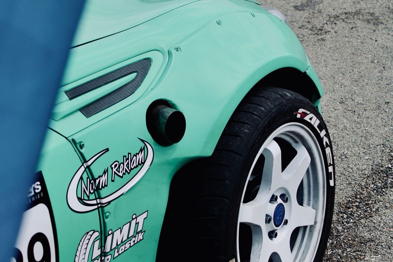 Close-up of a wheel arch and alloy rim, where the wheel speed sensor sits